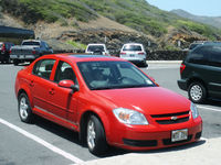 John napping in the Mighty Red Cobalt at Koko Head Park off Kalanianaole Hwy