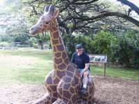 John riding Giraffe