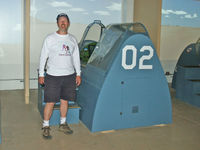 John standing near the flight simulator where he shot dozens of Zero's from the sky in an ultimate battle for victory.