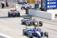 Paul Tracy leading a pack into the pits
